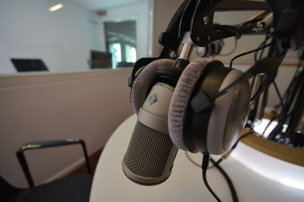 Studio microphone and headphones prepared for a professional audio recording session