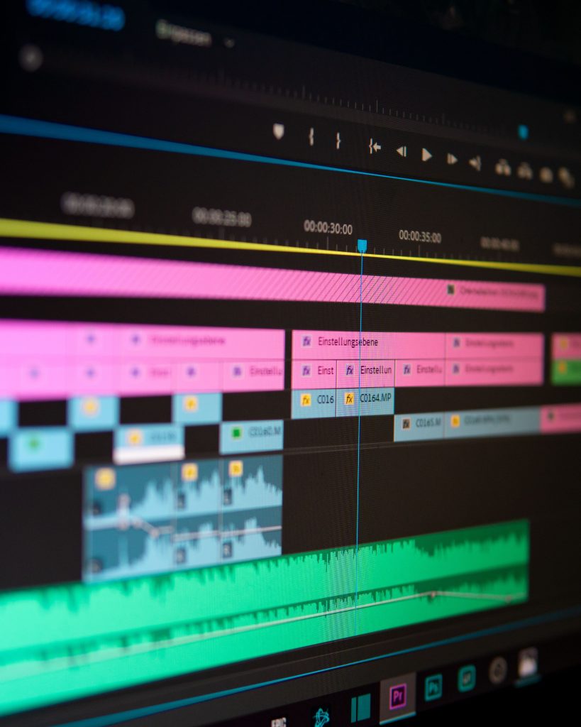 Close-up of a video editing timeline with frame thumbnails and clips